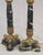 A beautiful vintage circa 1950s French empire neoclassical style marble and gilt bronze pair of table lamps. The stunning...