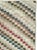 This mid-20th-century Turkish Anatolian accent rug presents a lively checkerboard composition formed from small square...