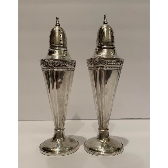 1930s weighted sterling silver salt and pepper shakers. Marked HG Silver Company on the bottom.