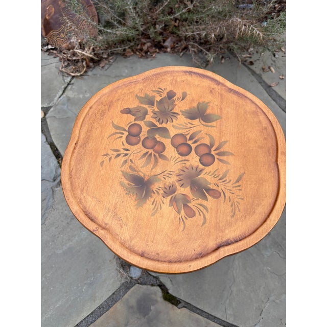 Round vintage Hitchcock table in excellent condition Stenciled Circa 1960s Makers mark on bottom 14" wide x 21.5" high
