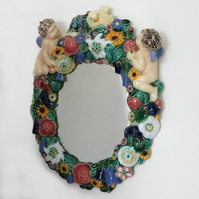 Model Number 287 Mirror from Michael Powolny, 1890s, in Flawless conditions. Designed 1890 to 1919 This piece has an...