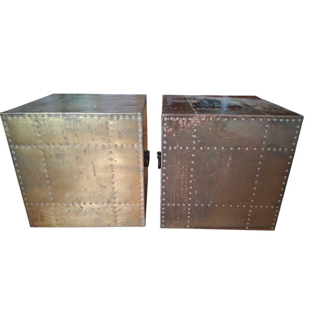 Pair of Sarreid, Ltd. brass clad cube end/occasional tables with copper rivets and rounded brass handles. 16" x 16" x 16"...
