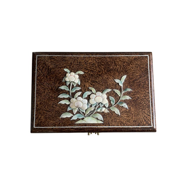 Beautiful vintage chinoiserie style jewelry box cabinet made of brown lacquered wood in a marble pattern with floral...