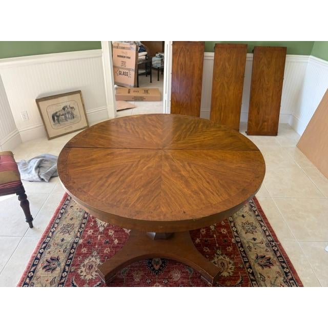 This Antique French Round Walnut Dining Table from circa 1880 is a stunning piece of furniture that exudes elegance and...