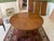This Antique French Round Walnut Dining Table from circa 1880 is a stunning piece of furniture that exudes elegance and...
