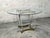 Beautiful designer table by Alessandro Albrizzi, round thick glass top, acrylic glass and brass legs, Italy, 1970. Very...