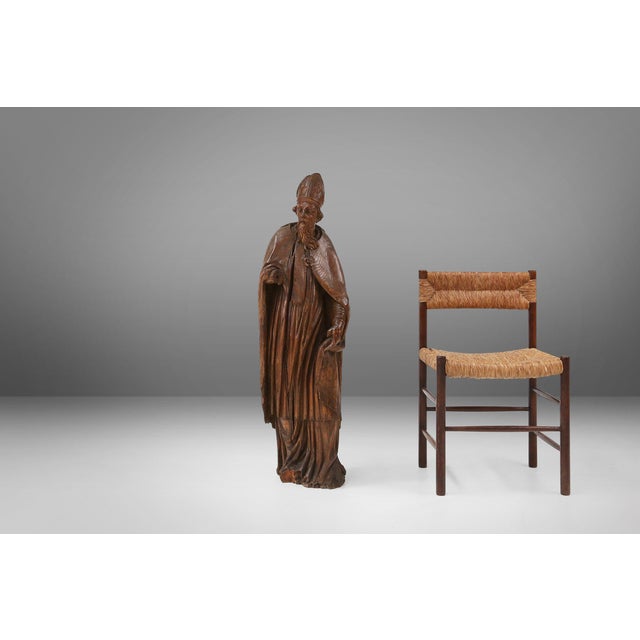 Religious statue of Saint Eligius from the 16th century in full wood found in France. This very rare find has a beautiful...