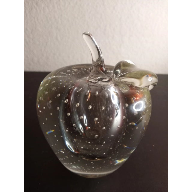 This is a Clear Art Glass Bullicante 5" Apple Shaped Paperweight. Procured at auction