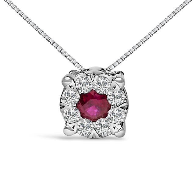 Discover the radiant allure of this exquisite necklace, crafted with the brilliance of a natural, color-enhanced ruby...