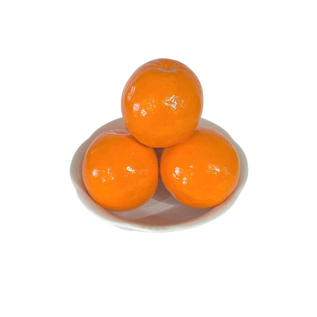 Absolutely charming bowl of 3 ceramic oranges in a white bowl. The oranges really do look genuine! The three oranges are...