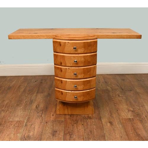 A striking Art Deco style console table / chest in figured maple, dating to around the 1930s The table features a...
