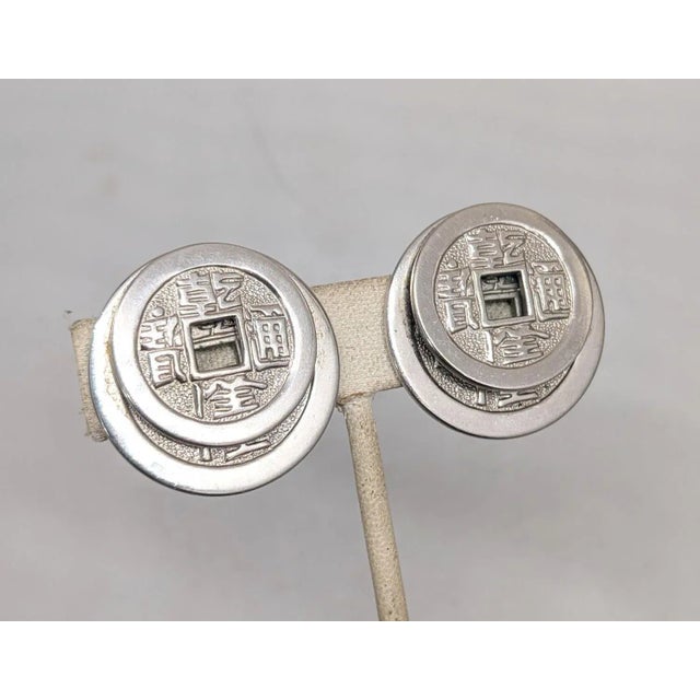 Vintage Signed Napier Doris Day Rhodium Plated Two Stacked Asian Coins Clip Earrings-2 Pieces For Sale In Philadelphia - Image 6 of 9