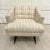 Here is a fabulous armchair from the mid-century that has been given a new life with a beautiful, textural woven...