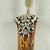 A letter knife or opener made of naturally shed Stag Horn with a Sterling Silver ferrule, England, circa 1890-1910. The...