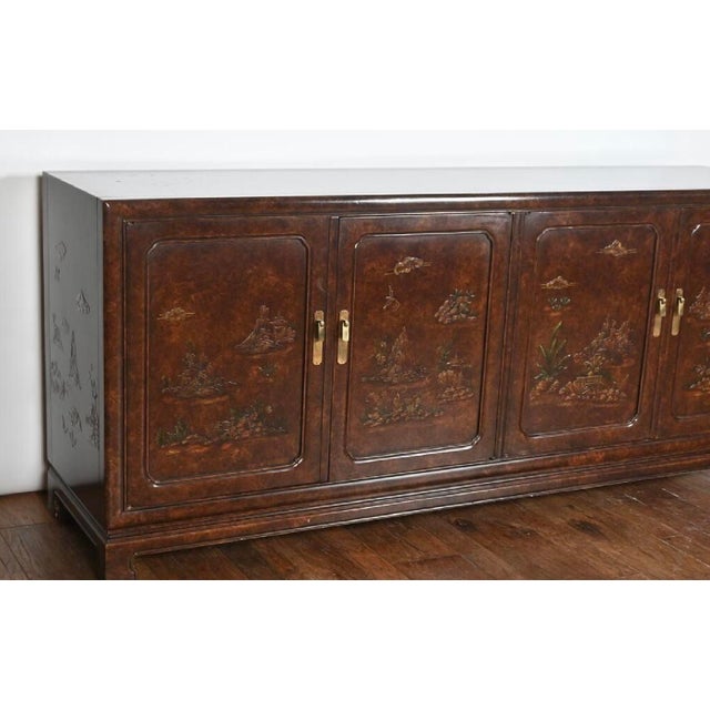 This striking sideboard, designed by Mario Buatta for John Widdicomb, features a rich faux tortoiseshell lacquer finish...