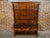 A Welsh cupboard from the 19th century with three drawers and open shelves. This 19th-century Welsh cupboard embodies the...