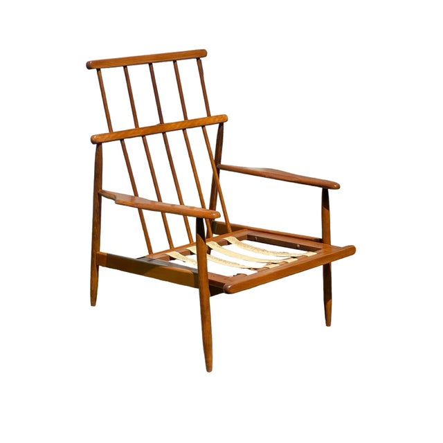 Bay Colony Antiques is proud to offer for sale this fantastic vintage Mid Century Modern Walnut armchair. We really don’t...