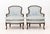 Pair of Louis XV Style Blue Floral Print Fabric Upholstered Bergeres. 35" H x 28" W x 27" D; seat: 19" H. Provenance: From...