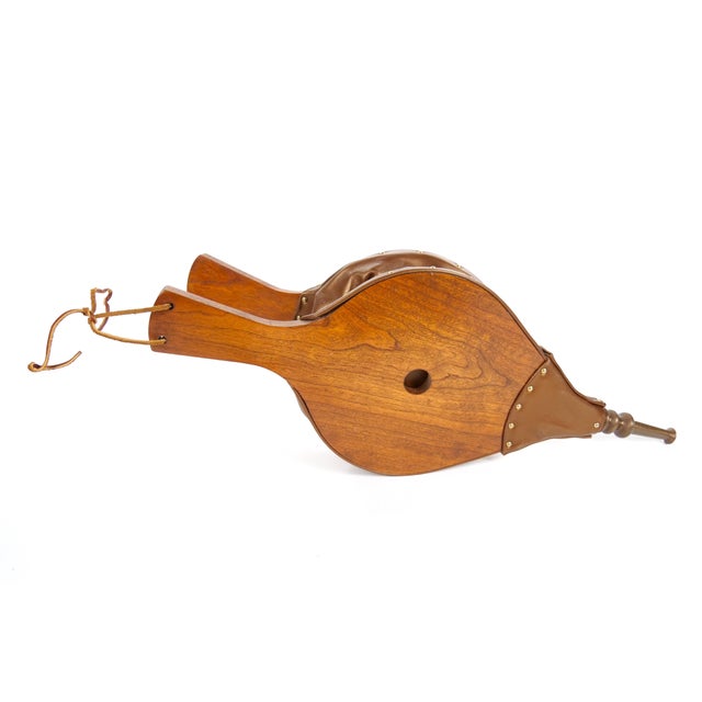 Enhance your fireplace with this elegant and functional handmade bellows, crafted in Europe in the late 20th century. This...