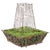 A large French painted iron wirework fernery jardinière featuring a distinctive tiered cloche-form superstructure....