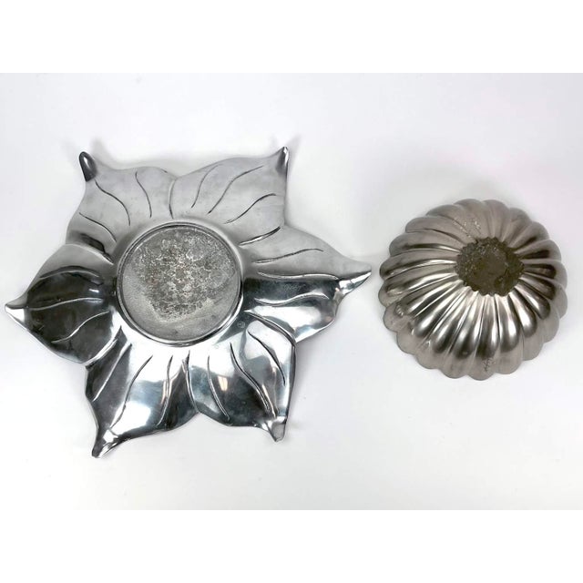 These pieces are Julia Knight handcrafted from sand cast aluminum with purplish enameled finish, markers mark remains to...