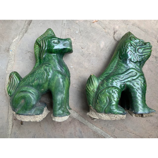 A nice pair of Asian an Foo dog and horse in glazed jade color.