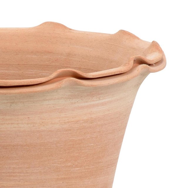 Add a historic element to your home or garden with this terra cotta planter from impruneta, italy. For centuries this...