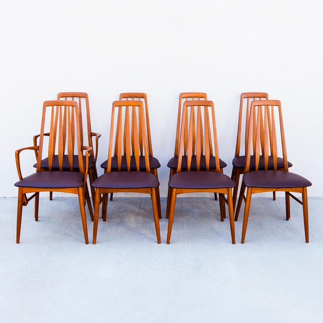 Meticulously restored set of eight mid century modern “Eva" dining chairs in teak by Niels Koefoed, made in Denmark by...