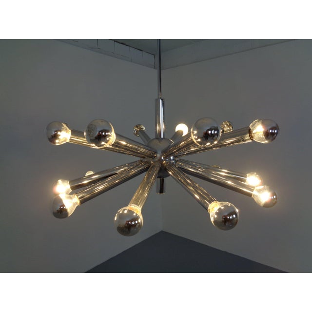 Gaetano Sciolari chandelier with 20 bulbs from the 1960s. The bulbs are not part of the offer. I have official proof of...