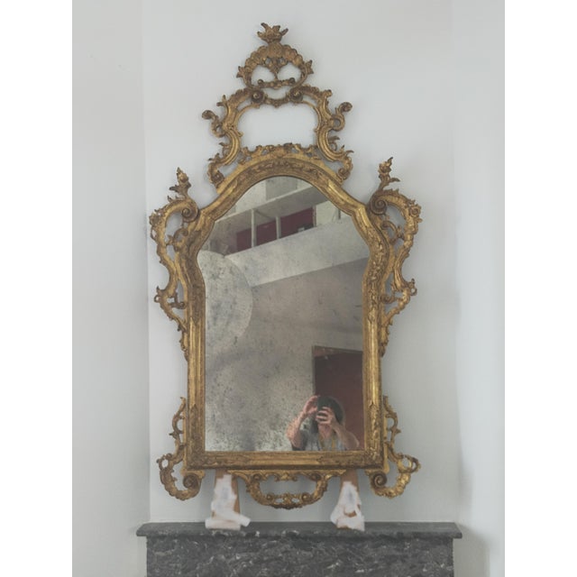 Large Louis XV style mirror in good condition, very decorative. Beautiful antique gilding.