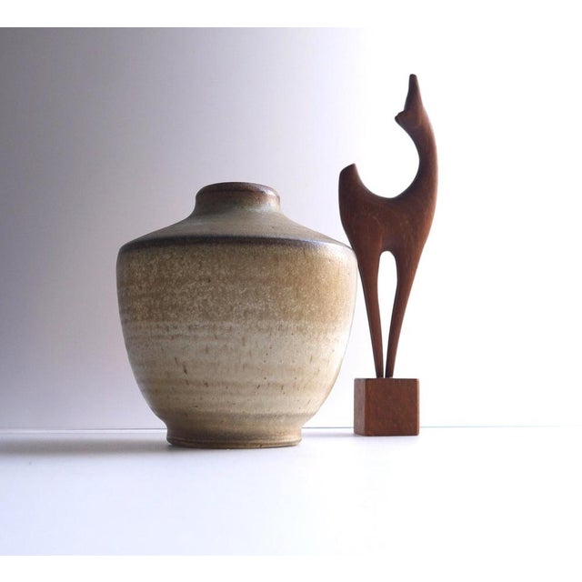 A fantastic vintage ceramic vase, handmade and design by Arthur Andersson, for Wallåkra Keramik, Sweden. The vase has a...