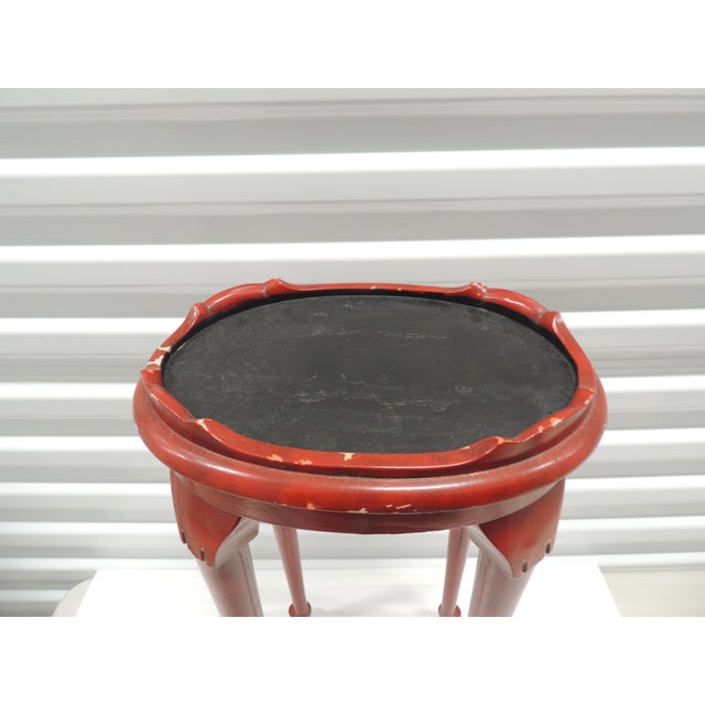 Vintage Small Oval Red and Black Painted Drinks Table by Trouvailles, Inc. Watertown, Massachusetts Not to be confused...