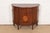 An exceptional French Regency Louis XVI style demilune cabinet or console table By Imperial Furniture of Grand Rapids USA,...