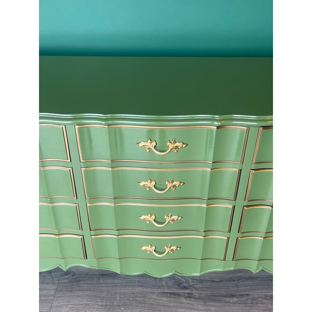Vintage French Provincial Dresser by Dixie. This is a solid built dresser of twelve drawers with dovetail joints This...