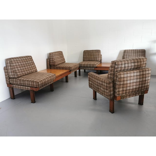 Pair of sofas consisting of armchairs and central coffee table, the set is completed by a single armchair with armrests,...