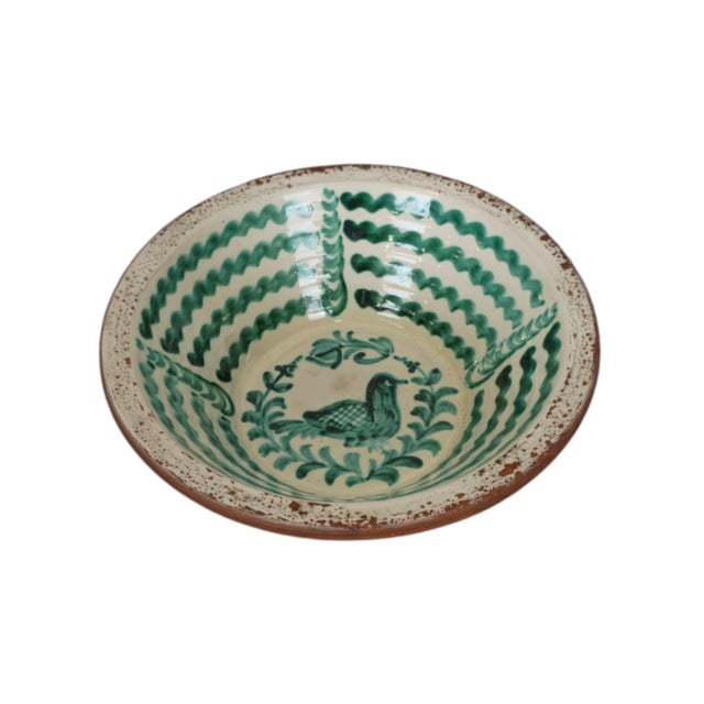 Spanish Ceramic Bowl with Green Bird Motif A Spanish earthenware bowl or decorative dish, painted in green on a cream...