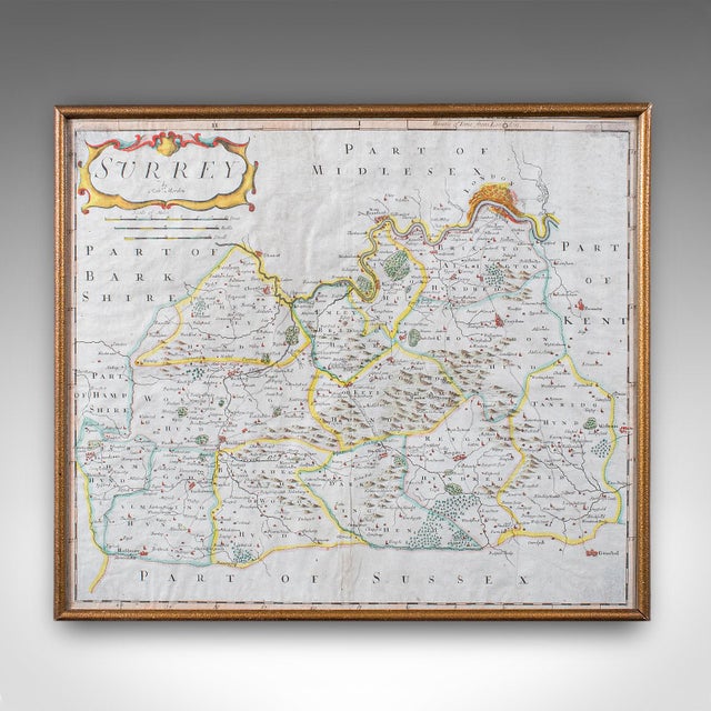 This is an antique map of Surrey. An English, framed atlas engraving by Robert Morden, this centre fold edition dating to...