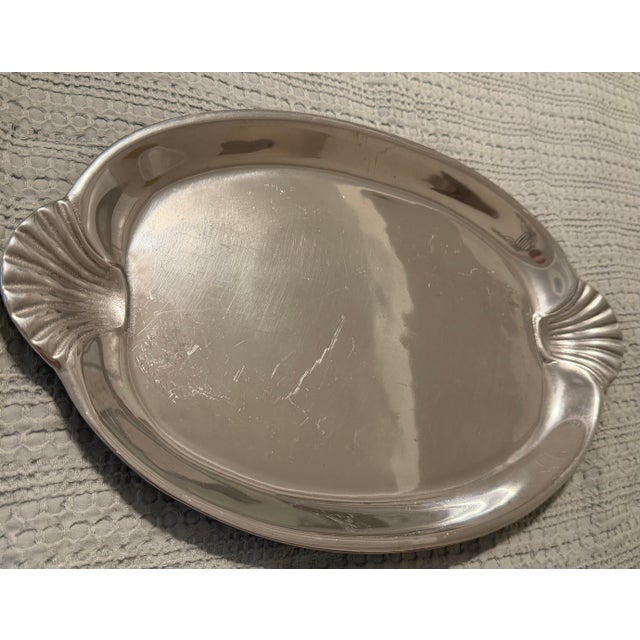 **Item Description:** Up for sale is a classic vintage Wilton Armetale Scallop Handled Oval Serving Tray / Platter....