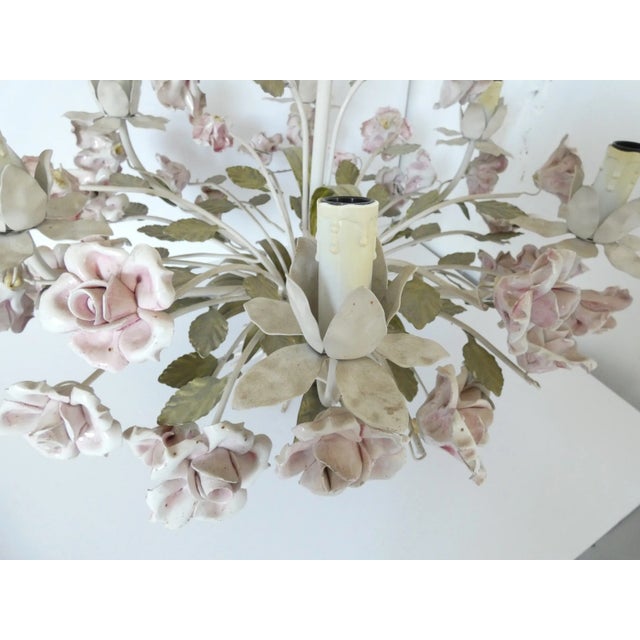 One beautiful vintage chandelier from the 1940s. This large bouquet with its porcelain roses is this sooooooo unusual, I...