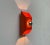 Wall light by Kaiser Leuchten in a bold orange tone, based on a design by Klaus Hempel from the 1970s. Space Age wall...