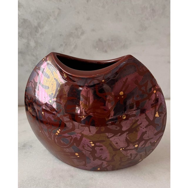 Vintage 1980s West Germany pottery vase by Bay Keramik. Metallic maroon finish with speckles of gold and splashes green...