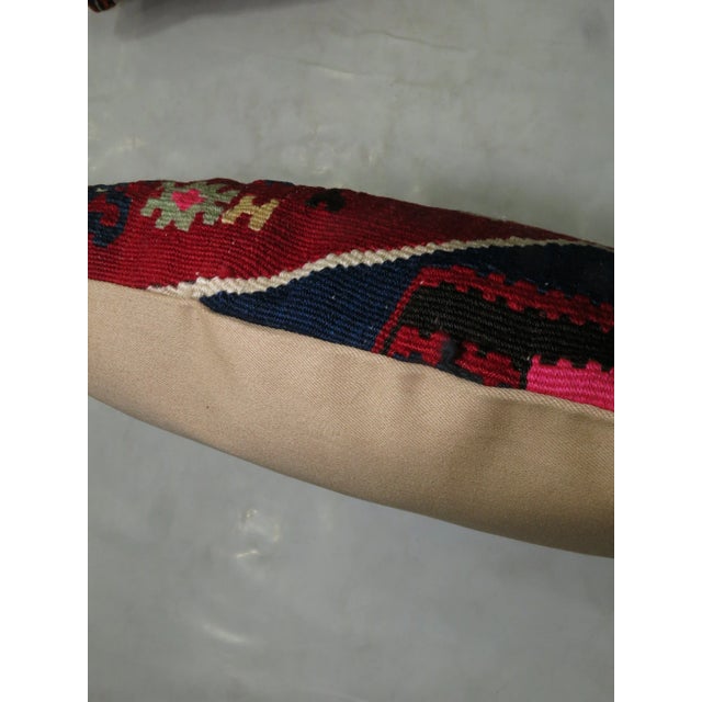 One of a kind Pillow made from a vintage turkish kilim with cotton back. Zipper closure and foam insert provided. 16'' x...