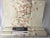 For sale are 2 rolls of Cole & Son “Breeze” wallpaper in color “Bisque”. The design is a vertical cascade of small white...