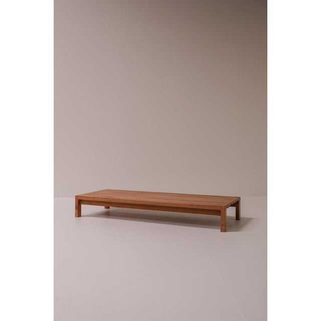 Low rectangular coffee table or bench by maison regain, made in france during the 1970s. Maison regain is particularly...