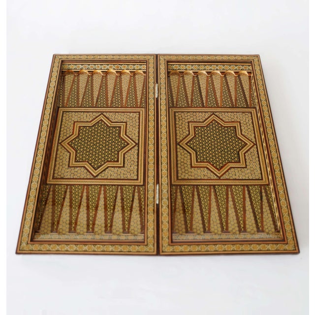 A one-of-one luxury chess and backgammon set crafted in full Khatam marquetry, designed to be played, displayed, and kept...