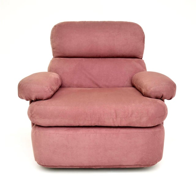 A very stylish and extremely comfortable vintage lilac suede lounge armchair. This was made in England, it dates from the...