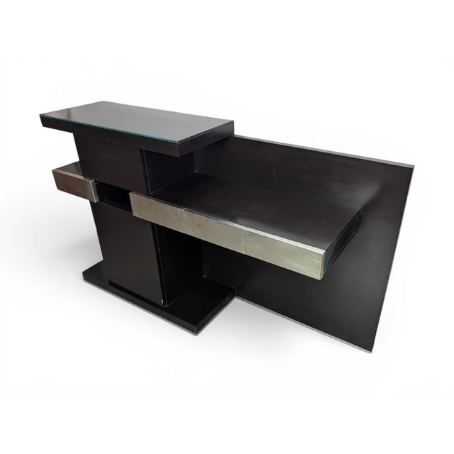 An elegant contemporary-style console bar, dating back to the 1980s or 1990s, featuring geometric lines and a striking...