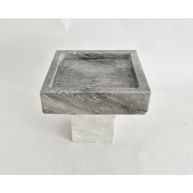 Contemporary 2-tone solid marble pedestal for use in serving or display. This is a heavy and solid piece that will bring...