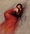 Crimson by Derek Harrison | Oil on Linen Painting of a woman in a red dress lying down For Sale