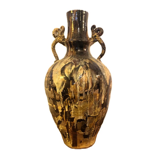 Monumental pottery piece by Flynn Sochon. This gorgeous vase is an astounding 33" tall and 14" wide. Its presence is...
